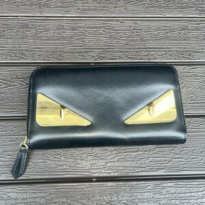 Fendi Roma Monster with gold metal eyes full zip wallet VGUC